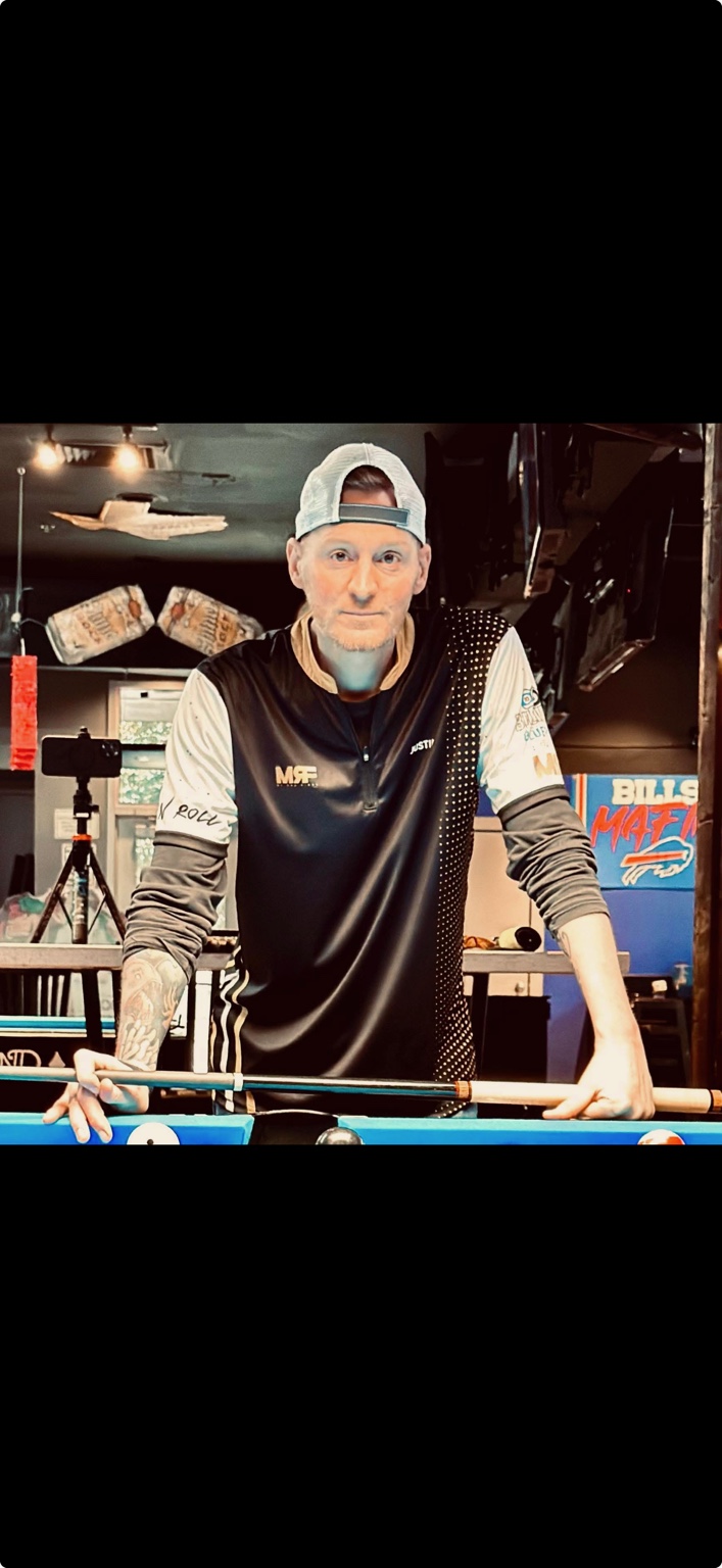 Justin Ingraham at a pool table